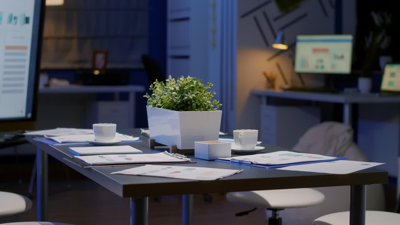 Close up of colleagues working on urban design with blueprints and building model