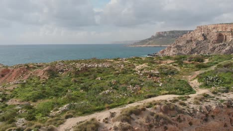 north coast of a island in a cloudy day aerial shot parallax pan up