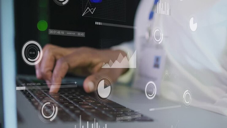 Animation of graphs on screens over hands of african american man working on laptop
