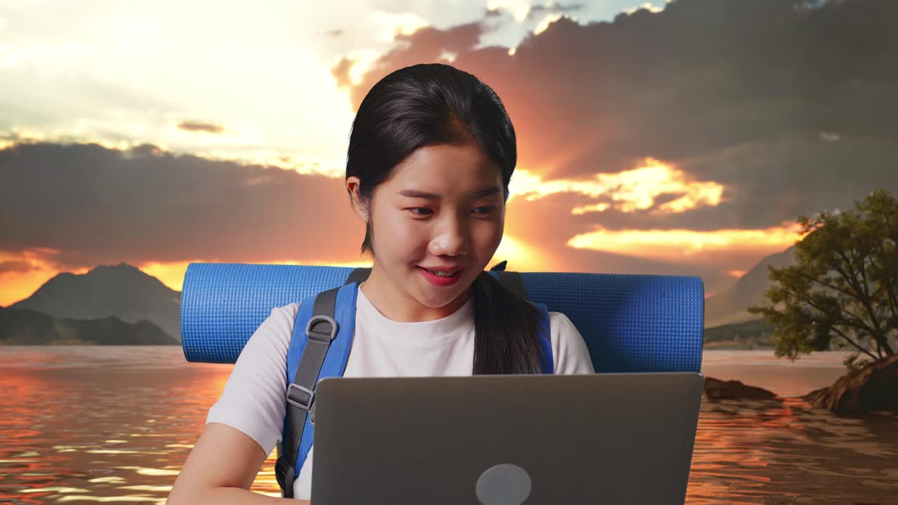 Woman on a Video Call During Sunset by the Lake