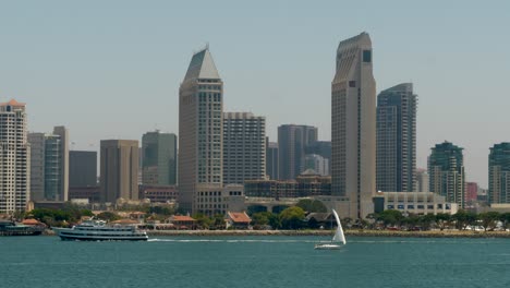 san diego skyline from coronado island during a beautiful day with boat traffic