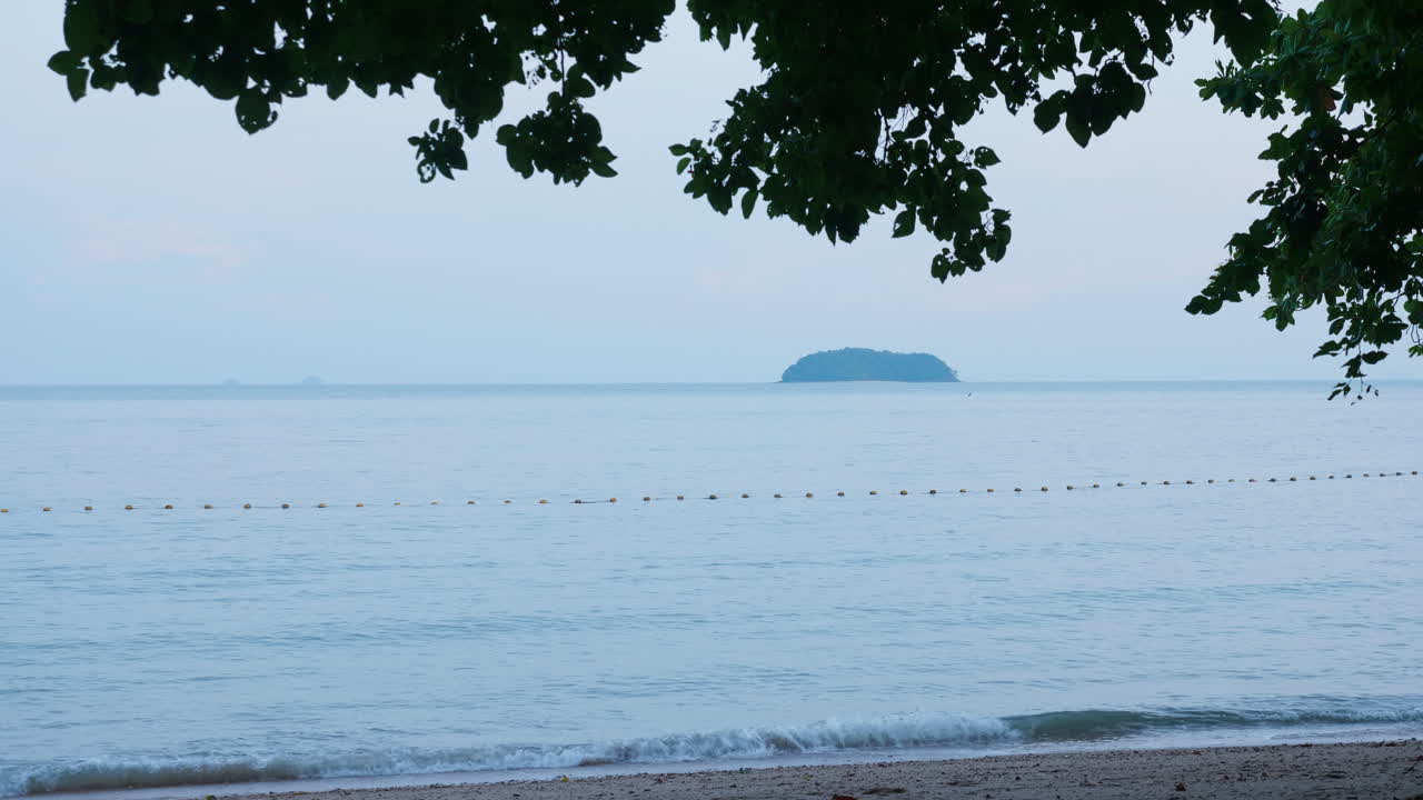 Coastal View with Island and Calm Sea