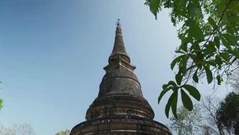 4K-Cinematic-religious-travelling-footage-of-the-Buddhist-Temple-of-Wat-Umong-in-Chiang-Mai,-Northern-Thailand-on-a-sunny-day