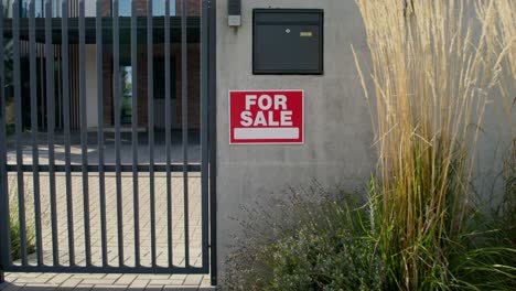 for sale sign on modern house