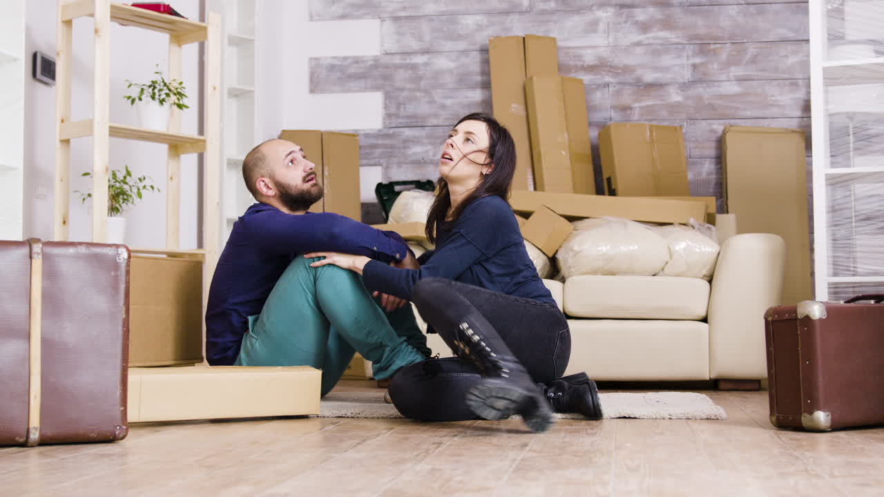 Couple moving into new apartment