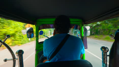 inside a green rickshaw in sri lanka