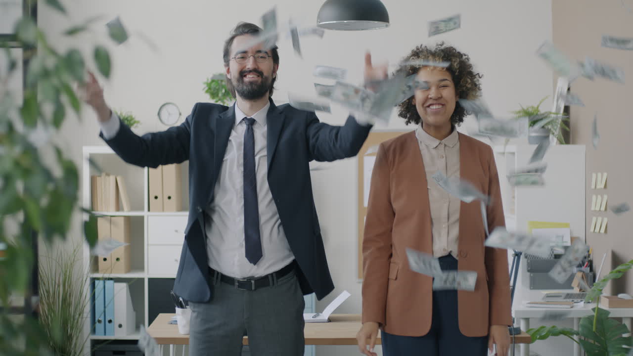 Business Colleagues Celebrating Success with Money Rain