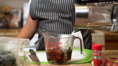 soaking dried ancho chilies in preparation for using them in a vegan recipe