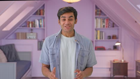 happy young indian young boy talking to someone