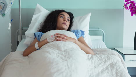 Hospital-bed,-woman-and-stress-from-medical