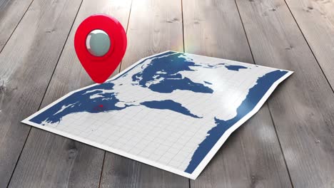 red pointer on a world map with lens flare