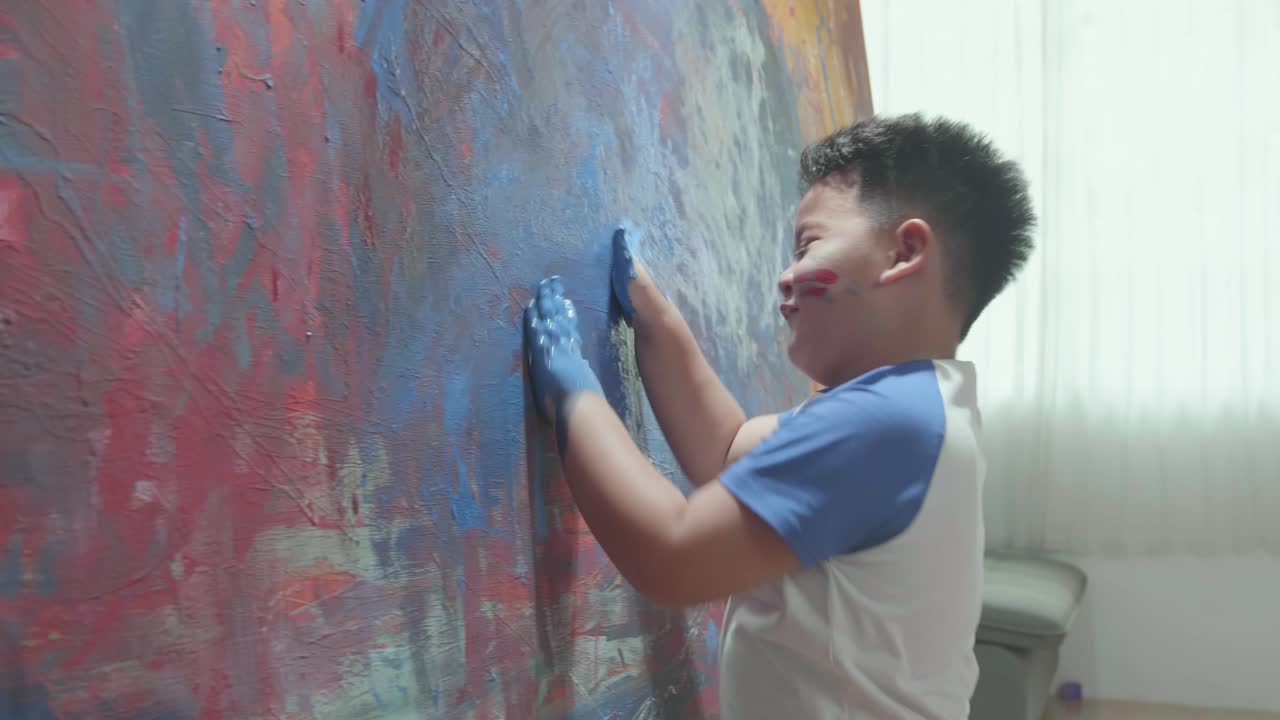 Child Painting on Large Canvas