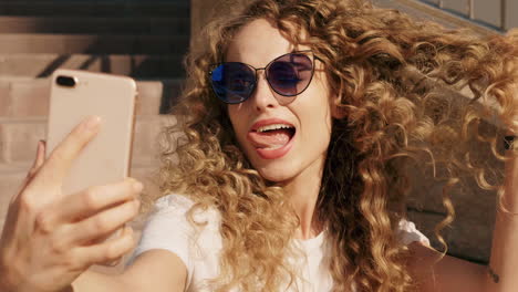 woman taking a selfie outdoors