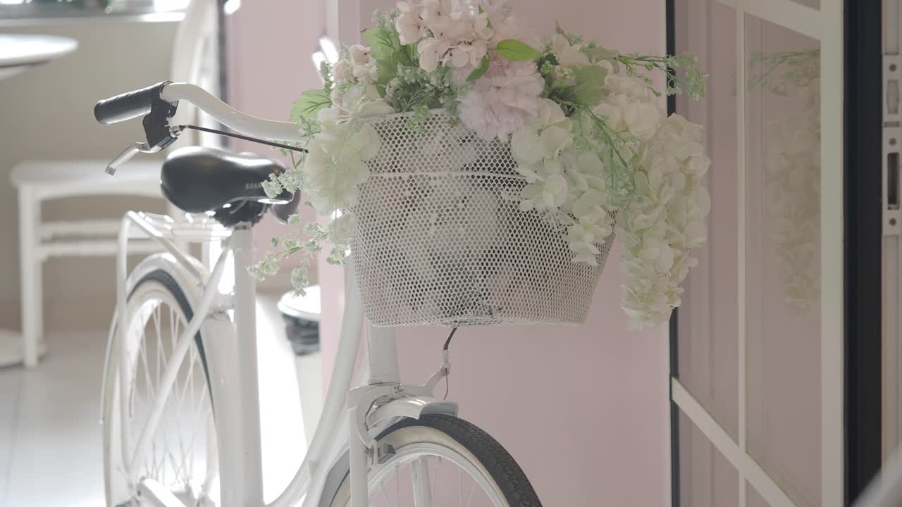 White Bicycle with Floral Basket