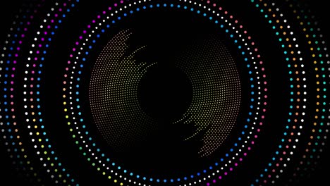 marco punteado de círculos multicolores en un fondo negro en video 4k.