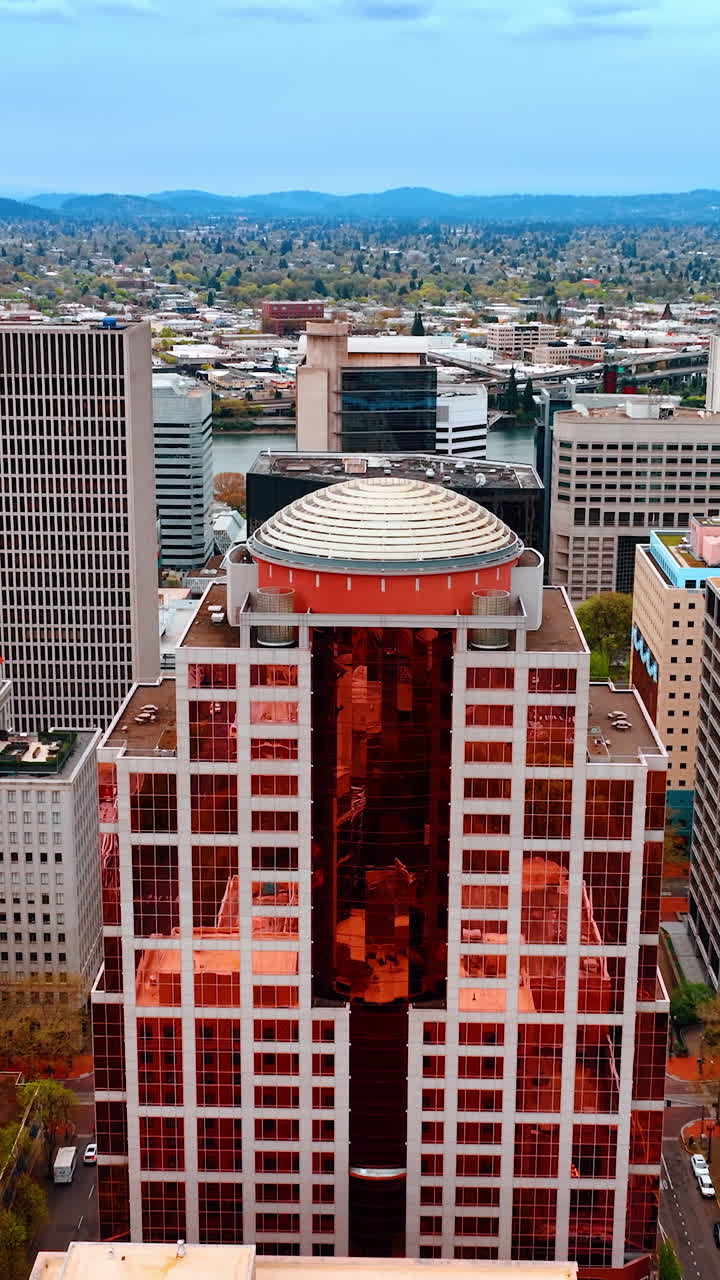 Drone shot of urban landscapes. American Portland modern city aerial view. Vertical video