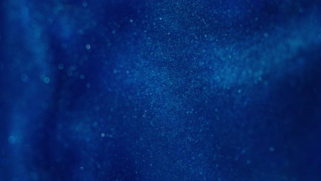 abstract blue glitter bokeh background