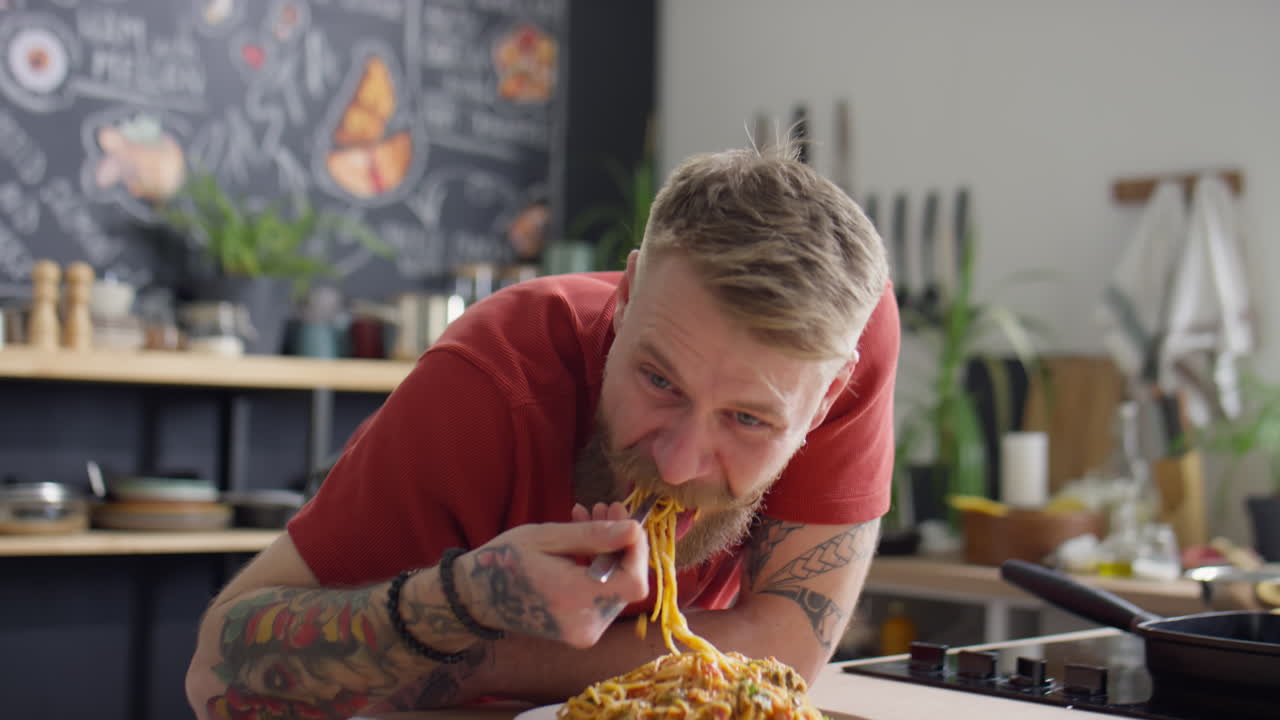 Food Blogger Eating Pasta and Speaking on Camera