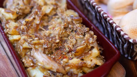 Dish of Baked Potatoes with Onions and Eggs