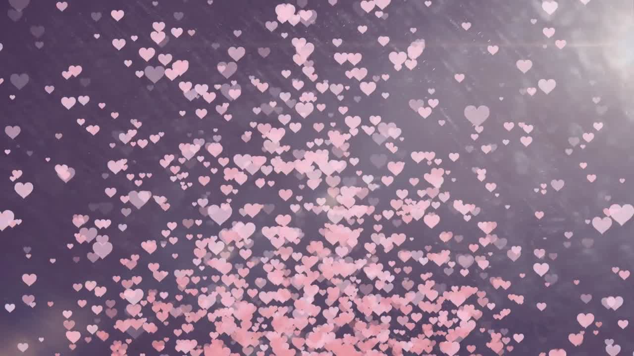 animación de puntos de luz y corazones sobre fondo azul