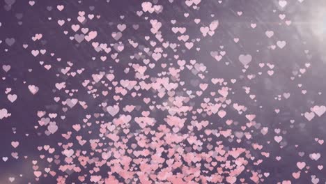 animation of light spots and hearts on blue background