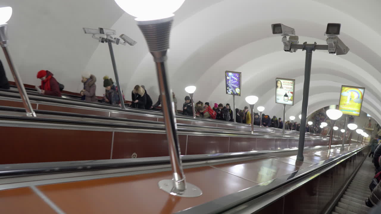 people on Escalator in the St. Petersburg metro in russia
