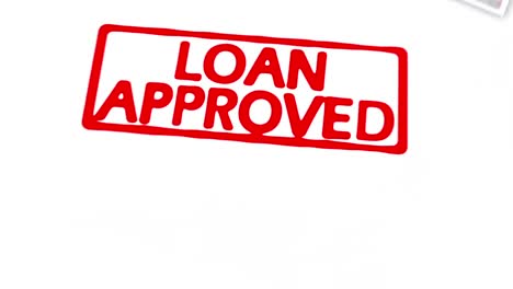 animated stamp spelling out loan approved