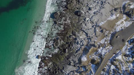 aerial birds eye view of uttakleiv beach on the lofoten island