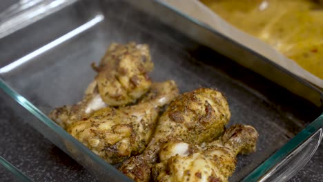 steam rising off freshly cooked chicken leg meat, showcased in a close-up bowl shot, evokes the anticipation of delicious food preparation