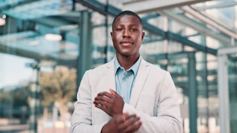 happy businessman in front of modern building