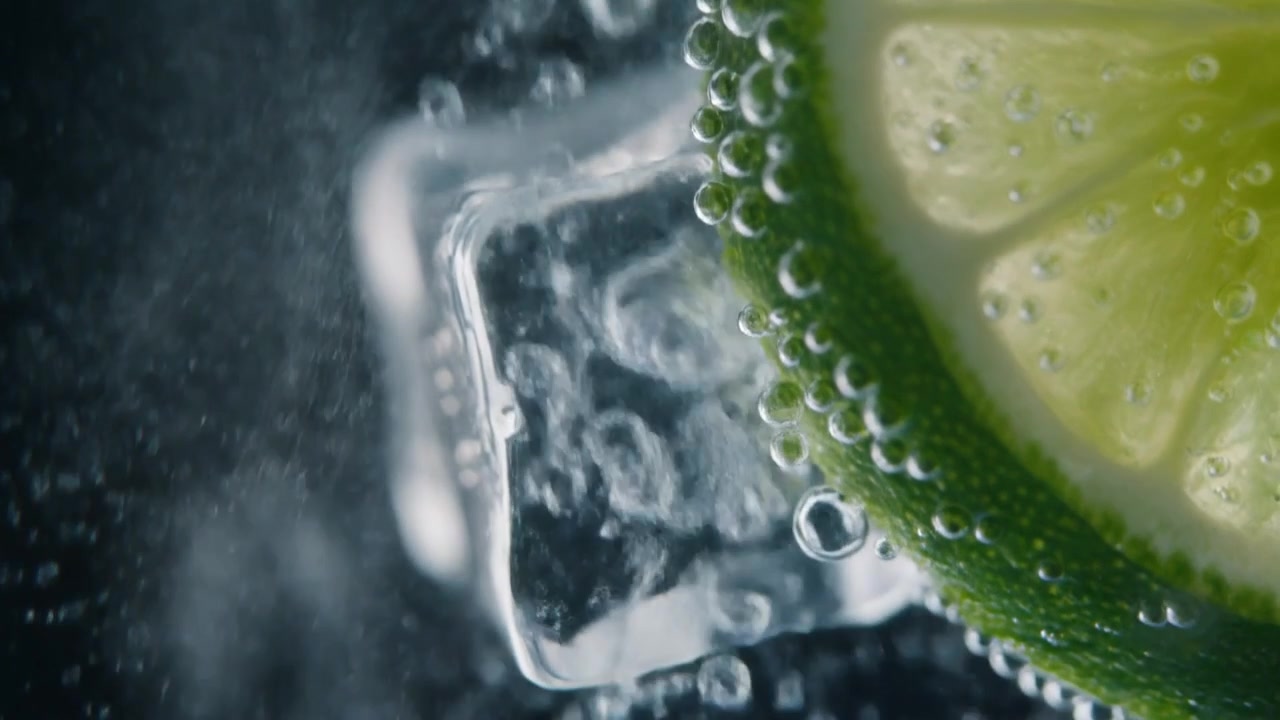 Lime Slice and Ice Cubes in Sparkling Water