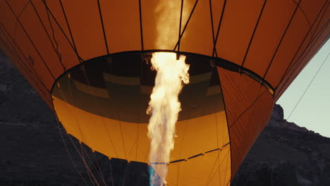 hot air balloon taking off at sunrise