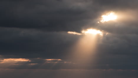 timelapse rays of sunlight through clouds