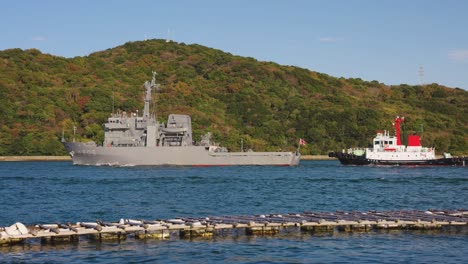 Japanese-Navy-Boat-Tugging-out-of-Toba-Bay,-Mie-Japan-4k