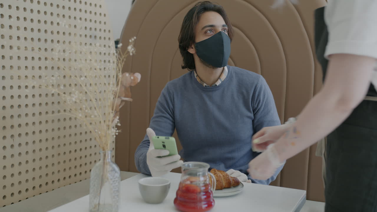 Customer at a cafe during Covid-19 pandemic