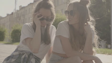 two happy women friends outdoors