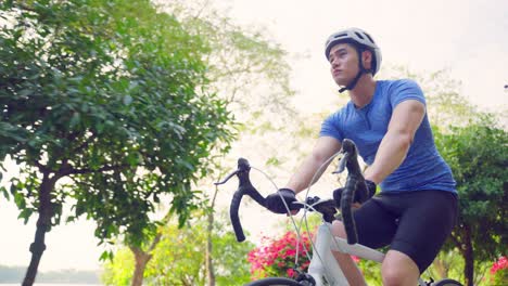 man cycling in a park