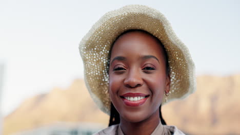 happy woman wearing a straw hat