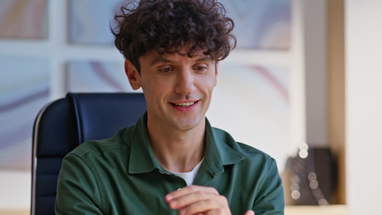 Freelancer waving hand webcam starting video call at modern workplace closeup