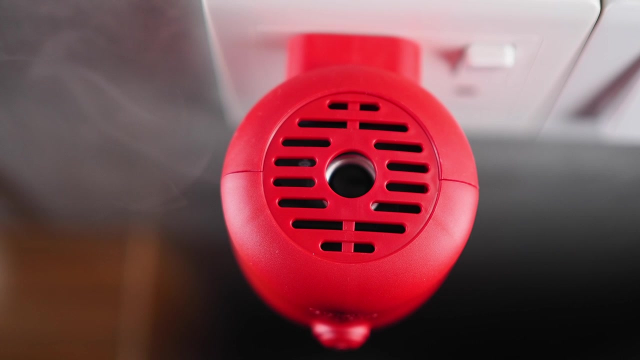 Red Electric Plug-in Air Freshener Releasing Fragrance Mist