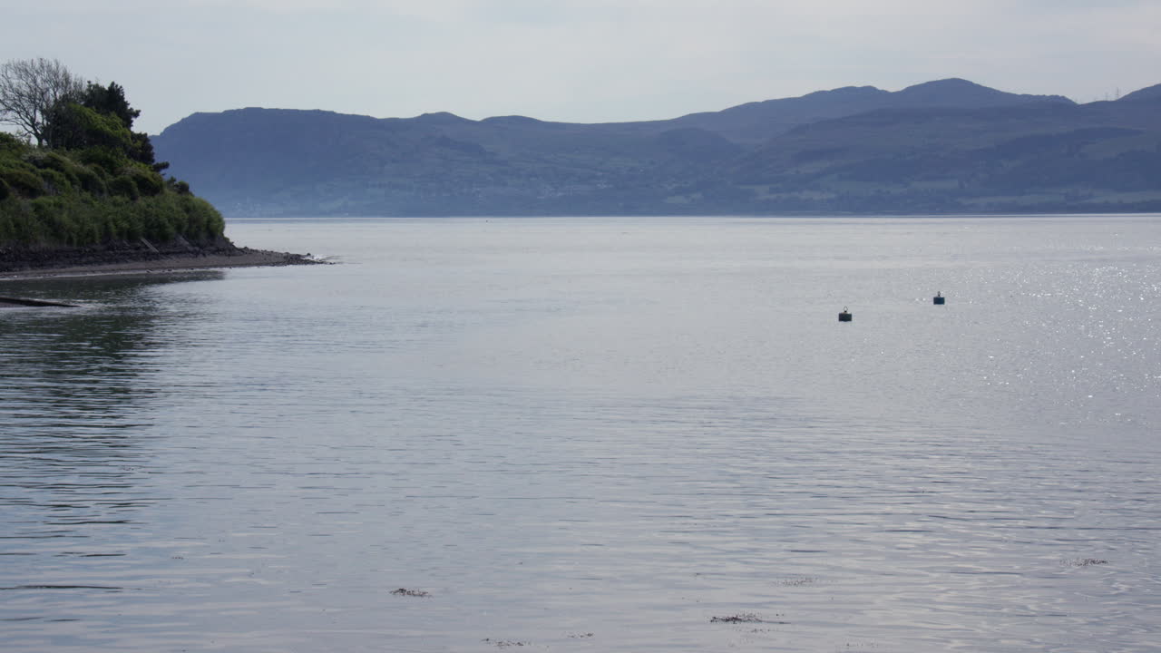 Wide shot Looking down the Menai Strait at Gallows point,