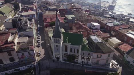 Aerial-Overhead-Of-Valparaiso-Lutheran-Church-On-Bright-Sunny-Day-With-Valparaiso-bay-In-background