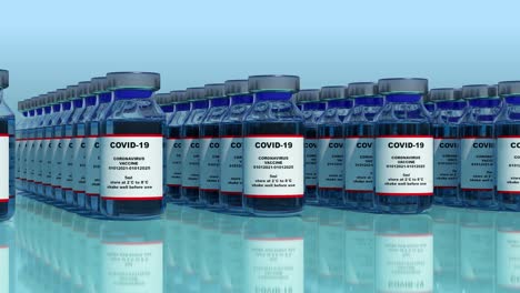 covid-19 coronavirus vaccine production and vials with coronavirus vaccine moves to the packing on the pharmaceutical production line. loop able video