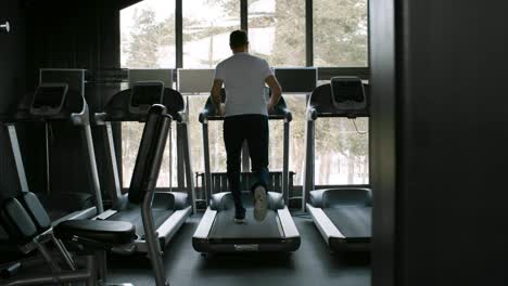 man working out in empty gym