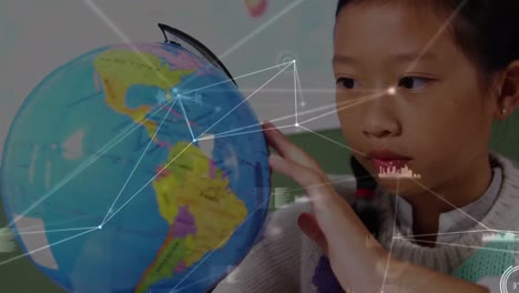 Animation-of-network-of-connections-over-asian-girl-touching-a-globe-model-at-school