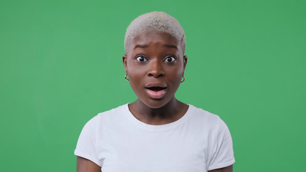 Surprised woman shaking her head