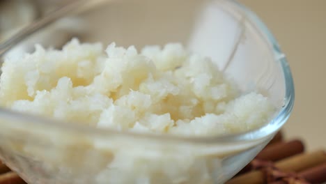 mashed garlic in a glass bowl