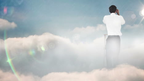 Businessman-on-ladder-looking-away-with-binoculars-on-blue-sky-background