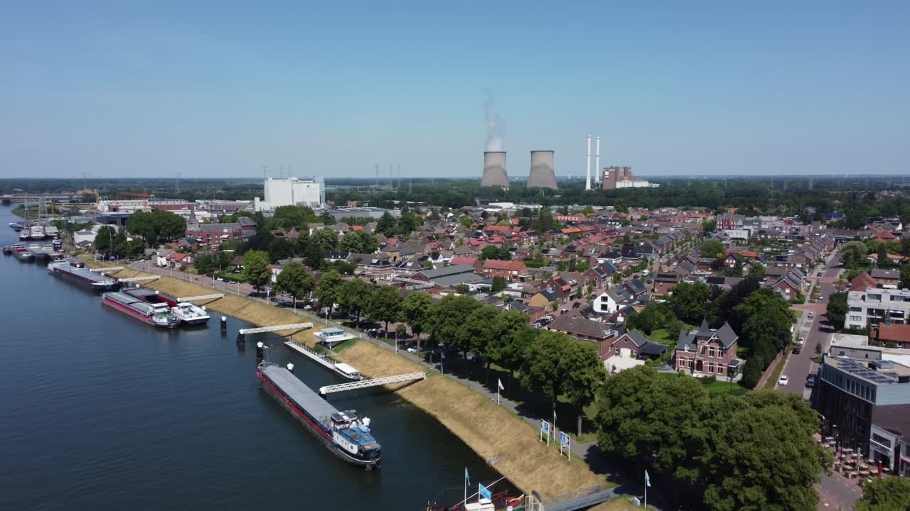 Gas-fired power station Clauscentrale behind city Maasbracht in the Netherlands, Aerial
