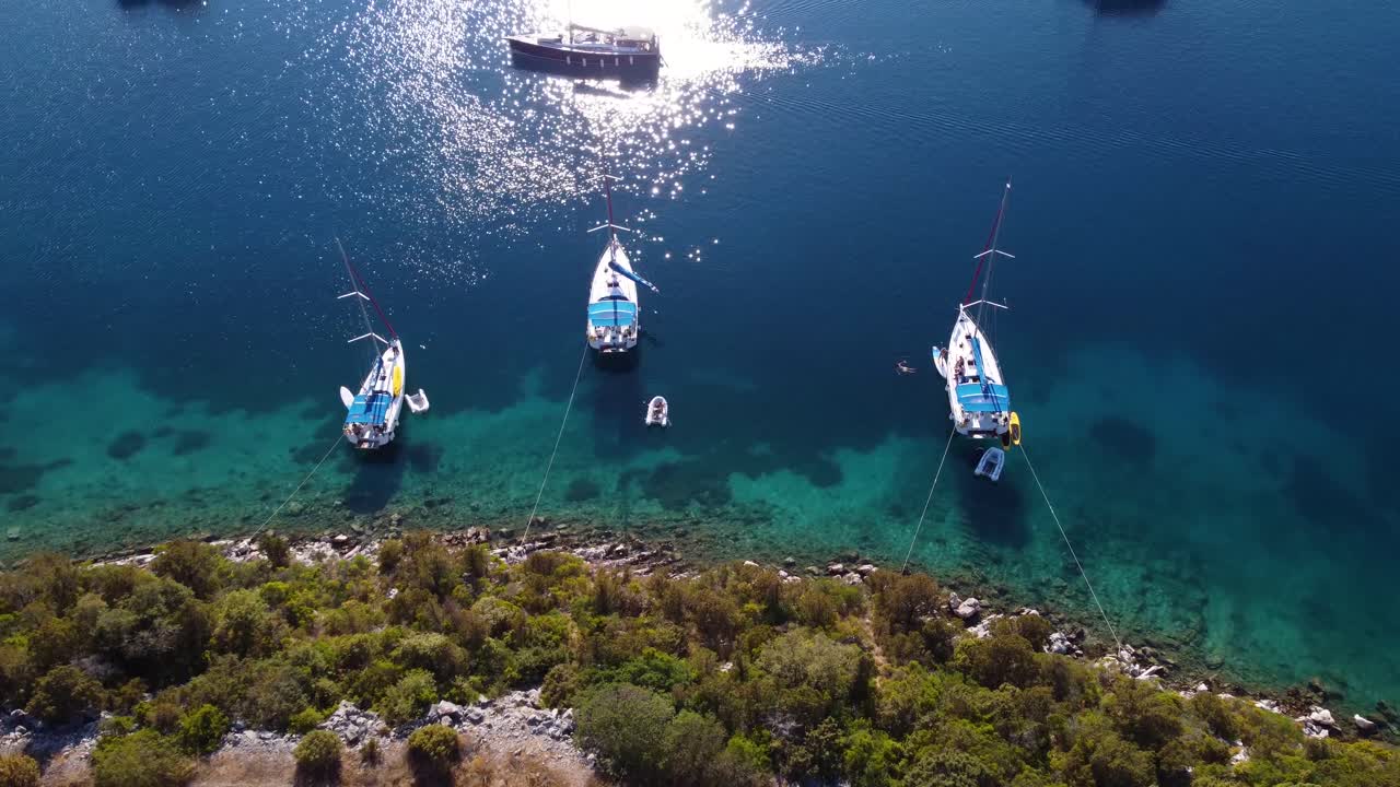 Aerial view above yachts tied to shore in Miljet island Croatia